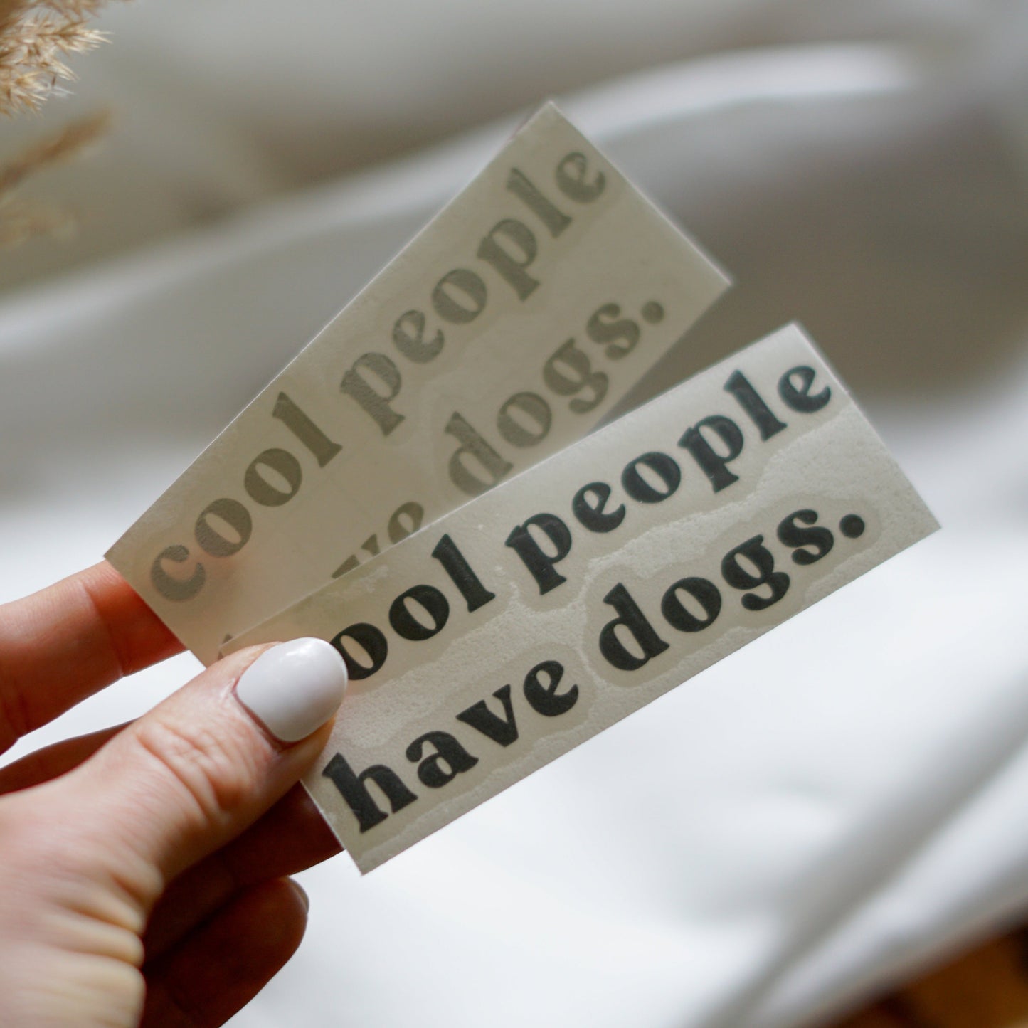 Sticker - lettering “cool people have dogs.”