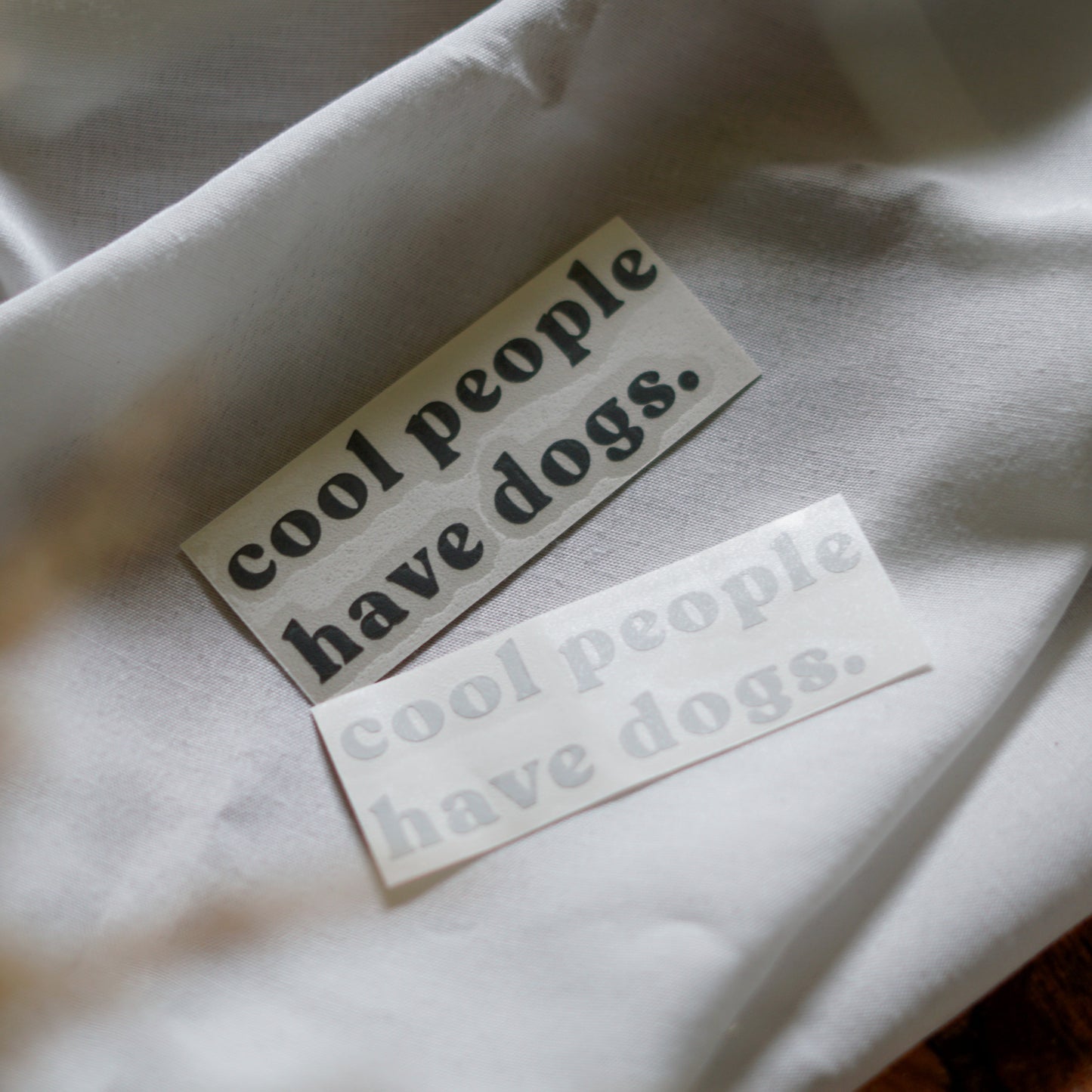 Sticker - lettering “cool people have dogs.”