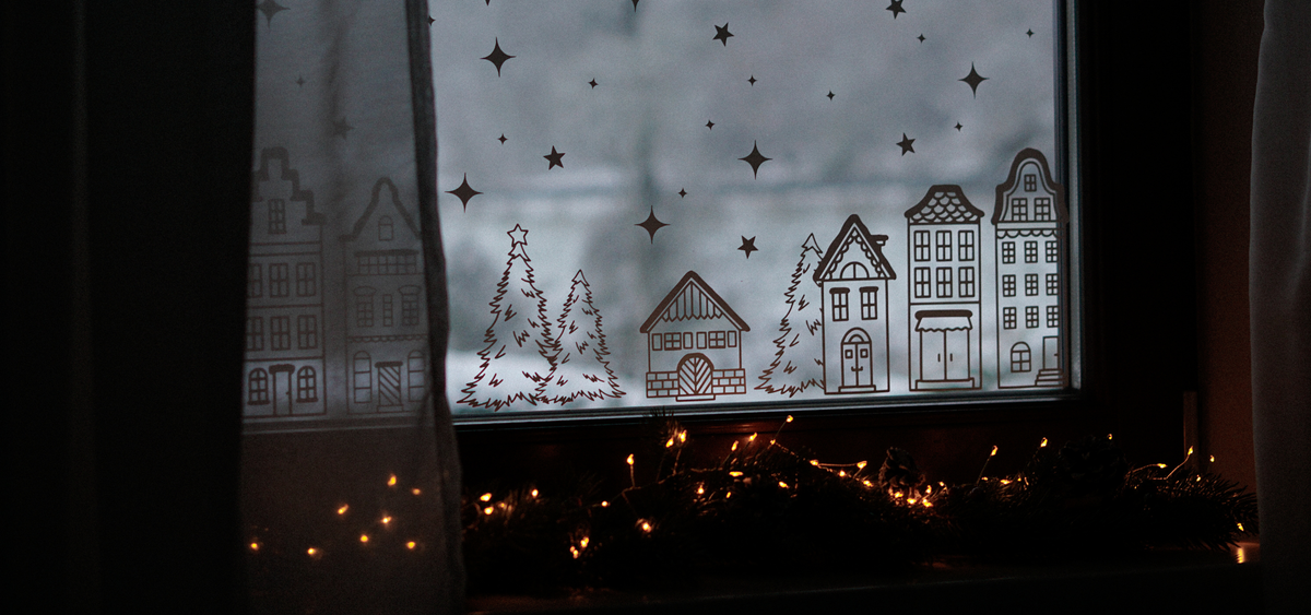 Weihnachtliche Häuserreihe als Fensterdeko