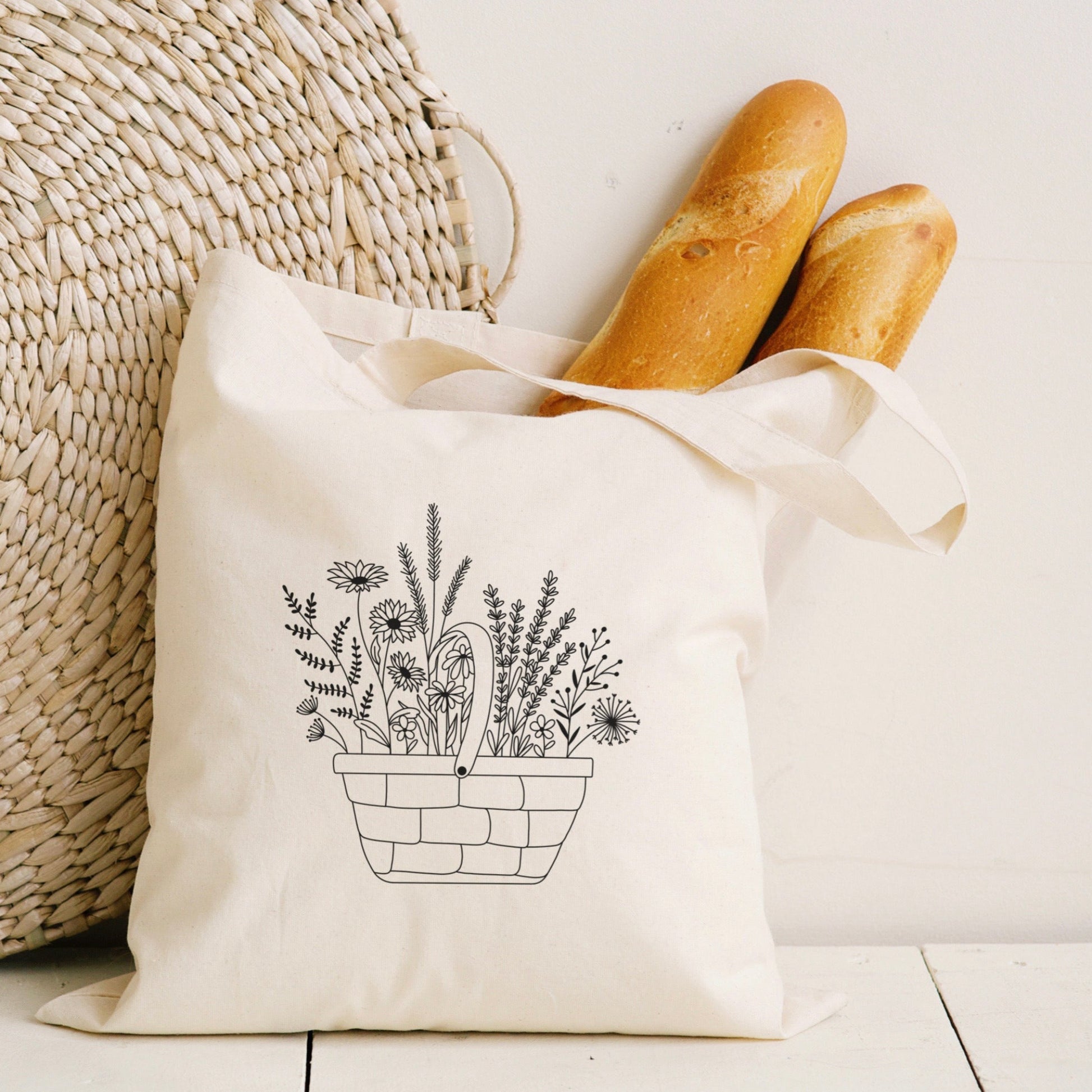 Digitale Plotterdatei mit einem Korb voller Wildblumen im Line Art Stil – florales Design für Shirts, Taschen, Kissen & DIY-Deko.