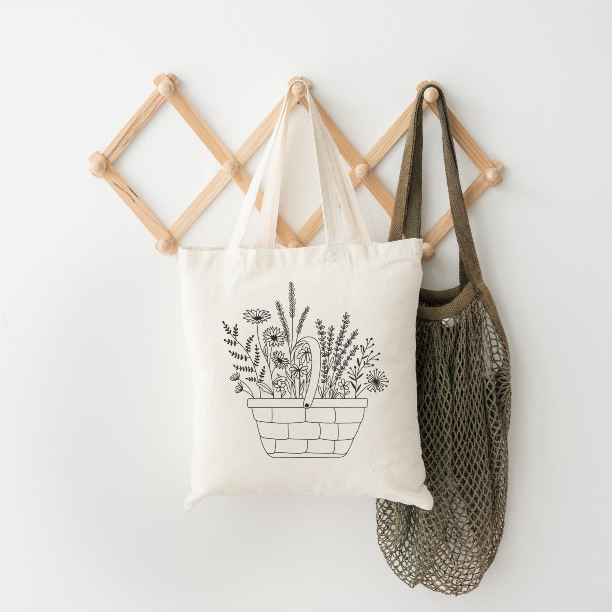 Digitale Plotterdatei mit einem Korb voller Wildblumen im Line Art Stil – florales Design für Shirts, Taschen, Kissen & DIY-Deko.