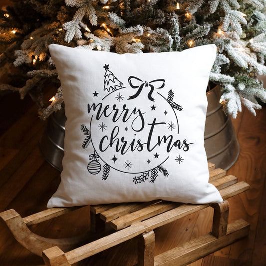 Merry Christmas Plotterdatei SVG mit Tannenbaum, Christbaumkugel, Schleife und Tannenzweigen auf weihnachtlichem Kissen